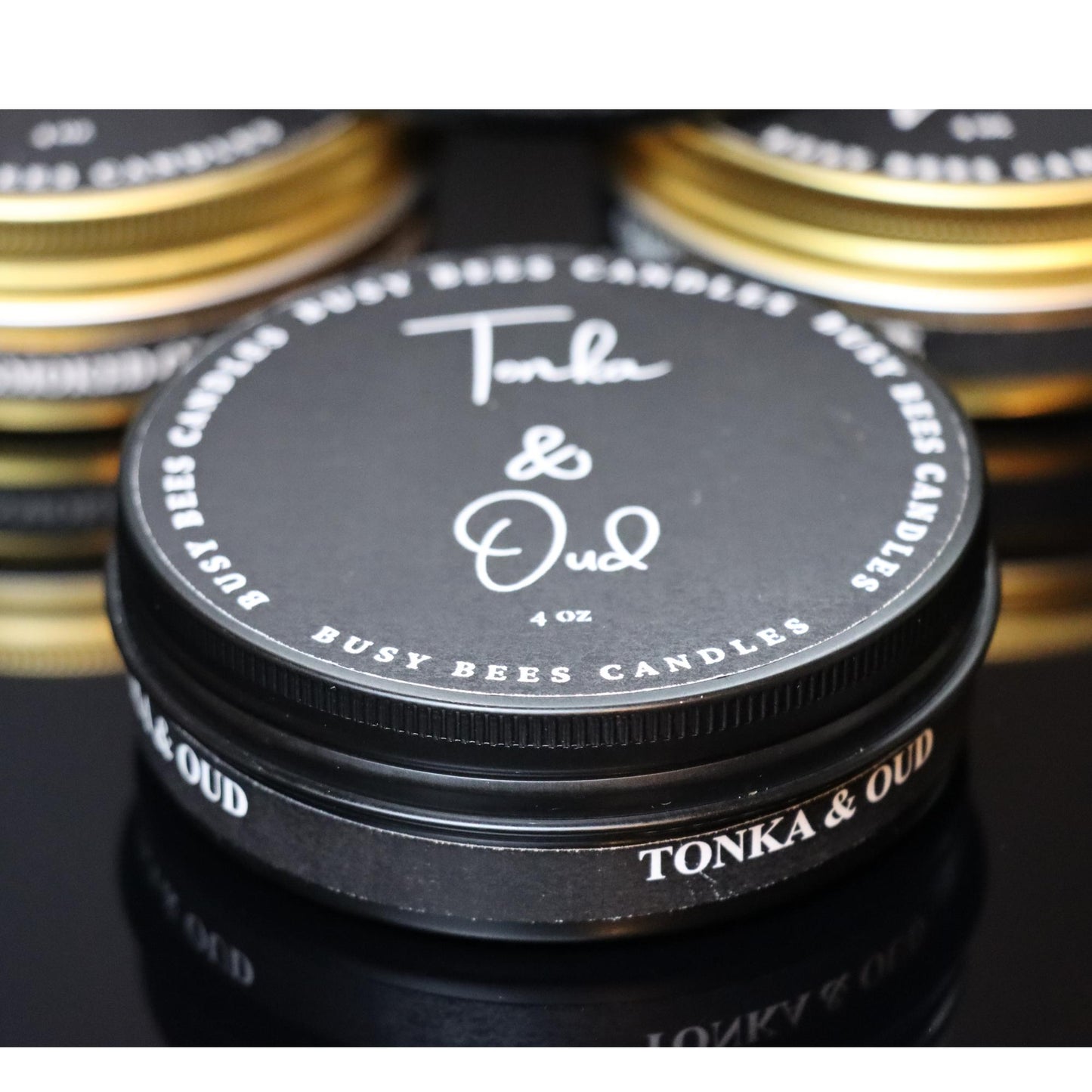 Black luxury tin by Busy Bees Candles Shop at busybeescandles.shop scent Tonka & Oud