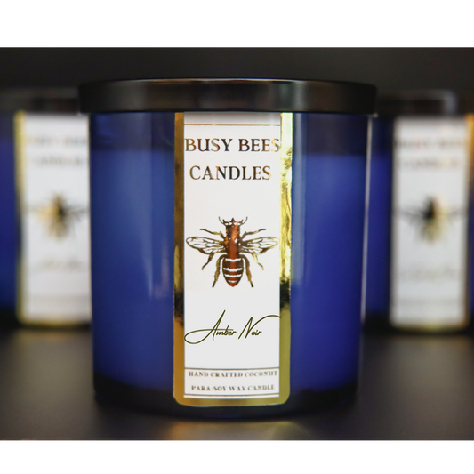 Blue candle jar gold label with busy bees candles shop bee label from busybeescandles.shop the fragrance Amber Noir